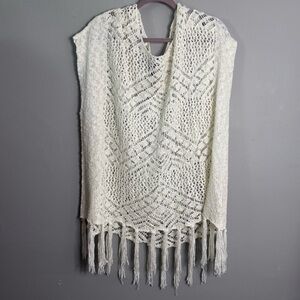 Elegant Cream Knit Poncho with Fringe